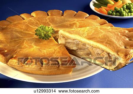 Chicken Pie With Slice - Non Exclusive View Large Photo Image Picture - Chicken Pie With Slice - Non Exclusive. Fotosearch