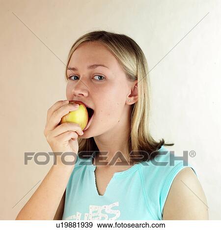 Stock Photo - Child with apple. Fotosearch