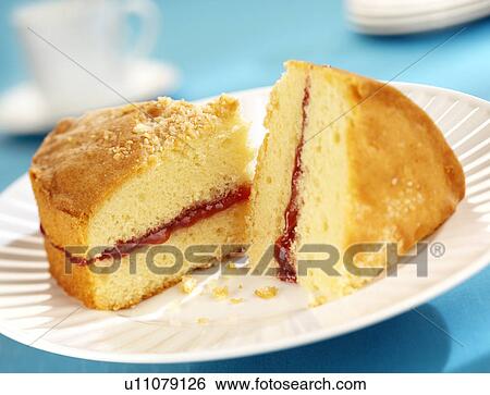 Stock Photograph - Coconut Sponge Cake - Non Exclusive. Fotosearch