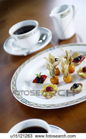 Coffee and petit fours View Large Photo Image Stock Image - Coffee and petit fours. Fotosearch