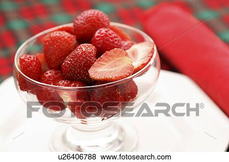 Stock Photo - Dessert bowl full of strawberries. Fotosearch