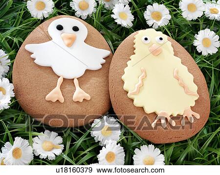 Stock Photo - Easter Cookies Biscuits on Grass - Non Exclusive. Fotosearch