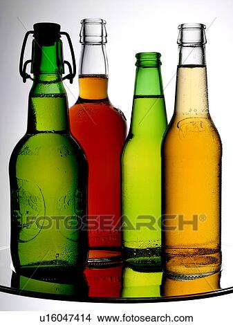 Picture - Four Beer Bottles - Non Exclusive. Fotosearch