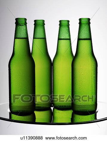 Four Beer Bottles - Non Exclusive View Large Photo Image Stock Photo - Four Beer Bottles - Non Exclusive. Fotosearch