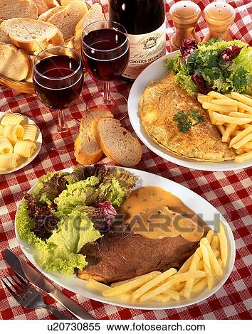 Stock Photography - French food, steak, omelette. Fotosearch