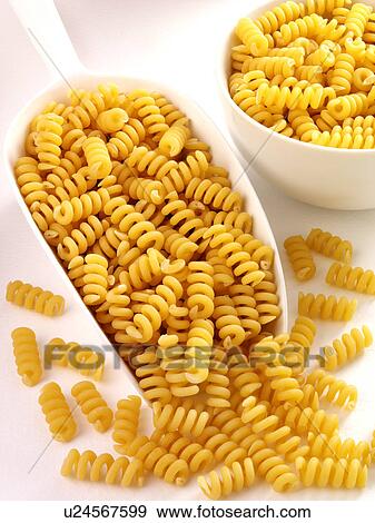 Stock Photo - Fusilli Bucati Pasta in Scoop - Non Exclusive. Fotosearch