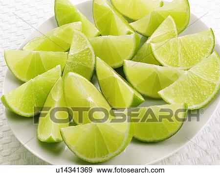 Lime Segments - Non Exclusive View Large Photo Image Stock Photo - Lime Segments - Non Exclusive. Fotosearch