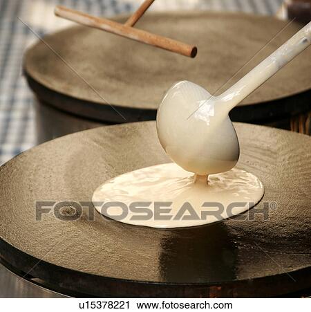 Making pancakes on a market stall View Large Photo Image Stock Image - Making pancakes on a market stall. Fotosearch