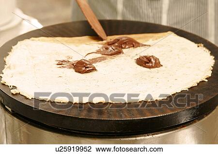 Making pancakes View Large Photo Image Stock Image - Making pancakes. Fotosearch