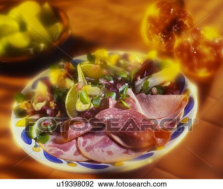 Stock Image - Mixed salami meats. Fotosearch