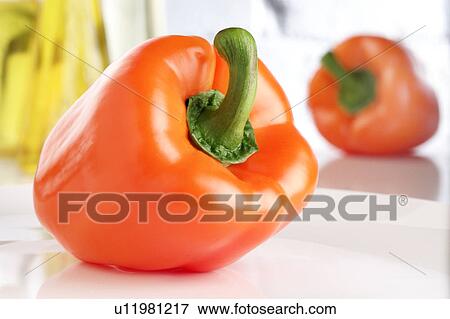 Orange peppers View Large Photo Image Stock Photo - Orange peppers. Fotosearch