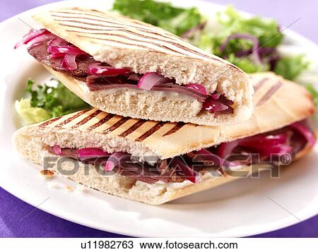 Stock Image - Panini With Beef and Red Onion - Non Exclusive. Fotosearch