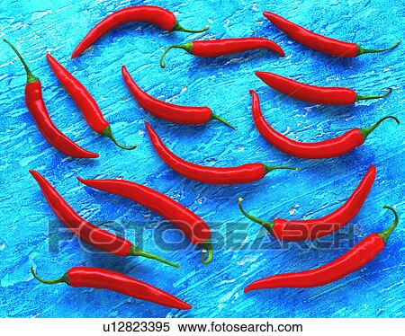 red chillies on blue View Large Photo Image Stock Photography - red chillies on blue. Fotosearch