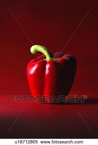 red pepper on a red background View Large Photo Image Stock Photography - red pepper on a red background. Fotosearch