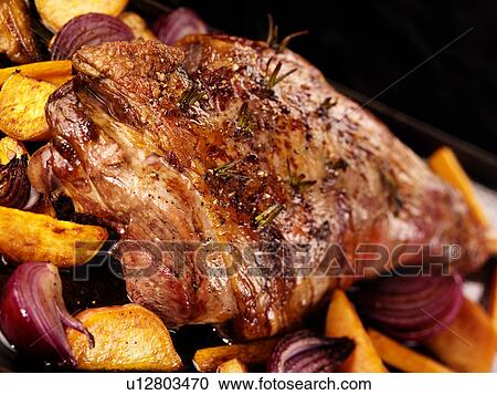 Stock Image - Roast Leg Of Lamb- Non Exclusive. Fotosearch