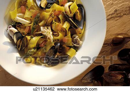 Squid and mussel pasta View Large Photo Image Stock Image - Squid and mussel pasta. Fotosearch