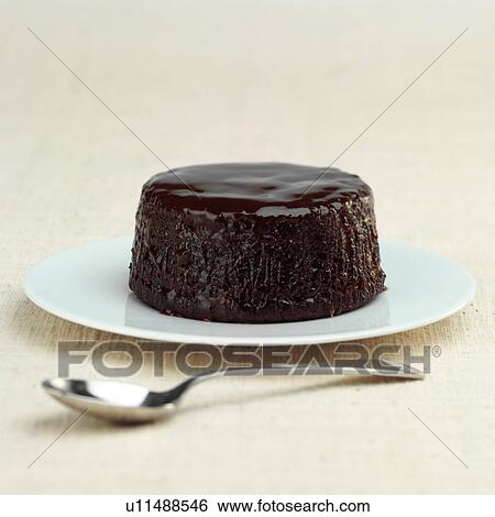 Sticky toffee pudding View Large Photo Image Stock Photograph - Sticky toffee pudding. Fotosearch