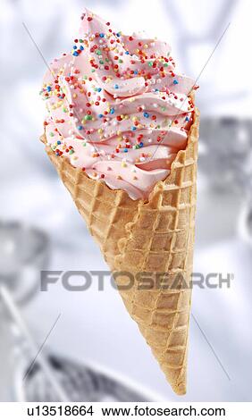 Picture - Strawberry Ice Cream Cone With Sprinkles on - Non Exclusive. Fotosearch