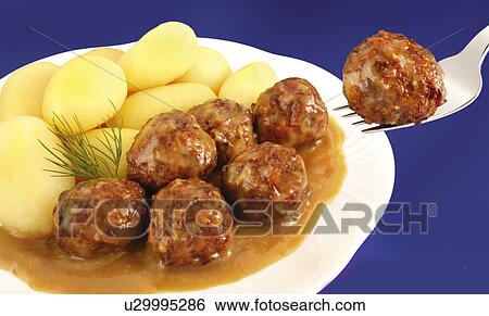 Stock Photograph - Swedish Meatballs And Gravy - Non Exclusive. Fotosearch