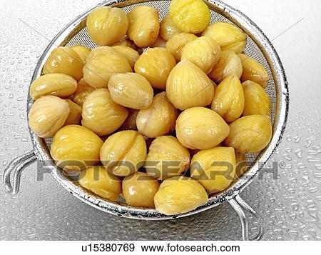 Sweet Chestnuts In Sieve View Large Photo Image Stock Photo - Sweet Chestnuts In Sieve. Fotosearch