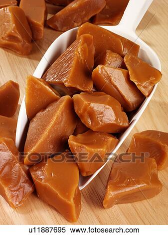 Stock Photography - Toffee in Scoop - Non Exclusive. Fotosearch