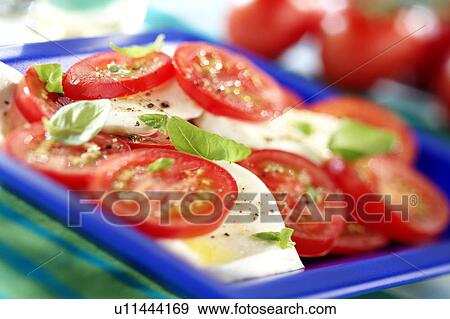 Tomato and mozzarella View Large Photo Image Stock Photo - Tomato and mozzarella. Fotosearch