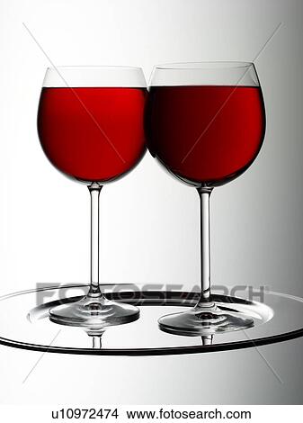 Picture - Two Glasses of Red Wine - Non Exclusive. Fotosearch