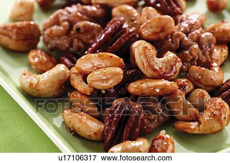 Assorted roasted nuts View Large Photo Image Stock Photo - Assorted roasted nuts. Fotosearch
