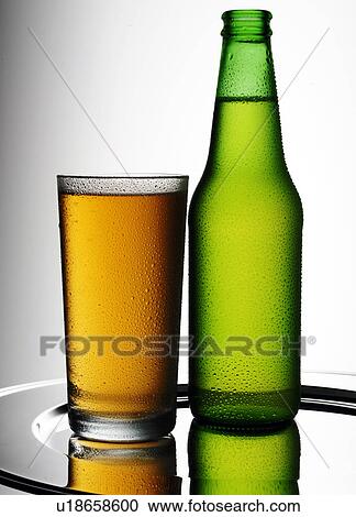 Stock Image - Beer Bottle And Glass - Non Exclusive. Fotosearch