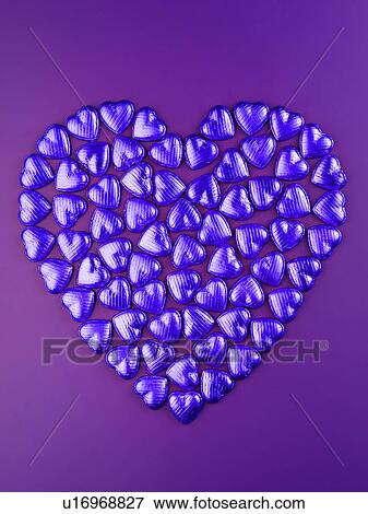 Blue Chocolate Heart on Purple - Non Exclusive View Large Photo Image Stock Photo - Blue Chocolate Heart on Purple - Non Exclusive. Fotosearch