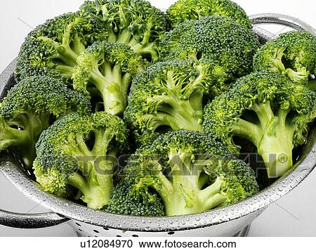 Stock Image - Broccoli Florets In Colander. Fotosearch