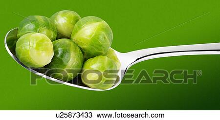 Stock Image - Brussel Sprouts on Spoon - Non Exclusive. Fotosearch