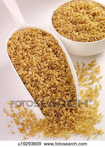 Stock Photo - Bulgur Wheat in Scoop - Non Exclusive. Fotosearch