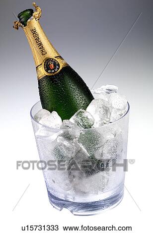 Stock Image - Champagne in Ice Bucket - Non Exclusive. Fotosearch