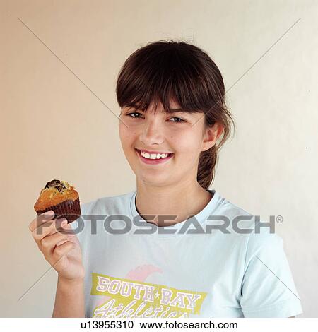 Stock Image - Child with cake. Fotosearch