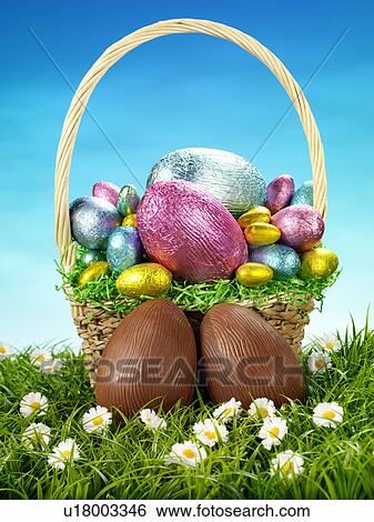 Stock Photograph - Chocolate Eggs in Basket - Non Exclusive. Fotosearch
