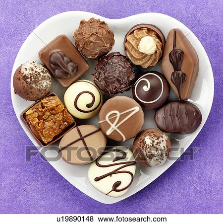 Stock Photo - Chocolates in Heart Shaped Dish - Non Exclusive. Fotosearch