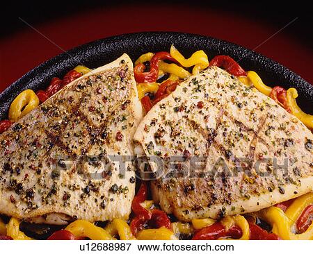 Stock Photo - Fish and peppers. Fotosearch