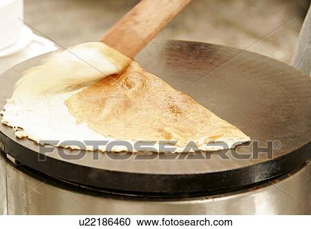 Folding a pancake View Large Photo Image Stock Image - Folding a pancake. Fotosearch