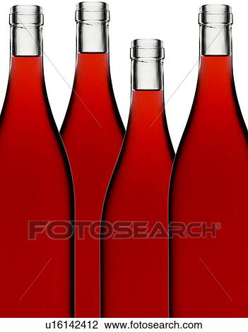 Stock Image - Four Red Wine Bottles on White - Non Exclusive. Fotosearch