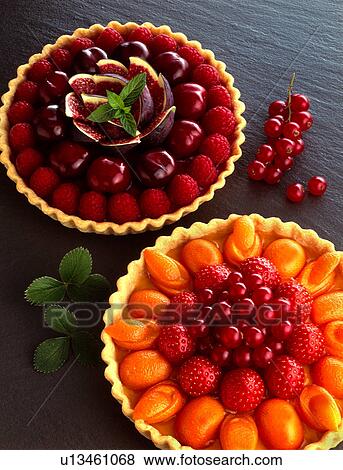 Fruit tarts on slate View Large Photo Image Stock Photo - Fruit tarts on slate. Fotosearch