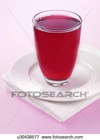 Stock Photo - Glass Of Pomegranate Juice. Fotosearch
