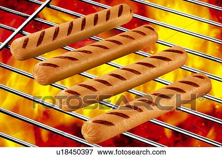 Stock Photo - Hot dogs barbecue. Fotosearch