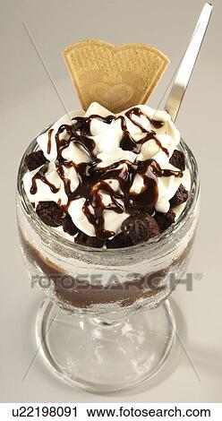Stock Image - Ice Cream And Chocolate Sauce - Non Exclusive. Fotosearch