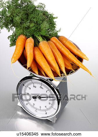 Kitchen Scales Filled With Carrots - Non Exclusive View Large Photo Image Stock Photography - Kitchen Scales Filled With Carrots - Non Exclusive. Fotosearch