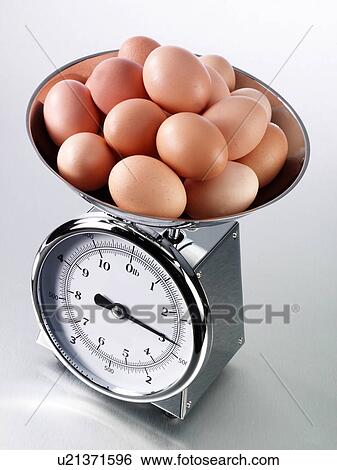 Kitchen Scales With Brown Eggs - Non Exclusive View Large Photo Image Stock Photograph - Kitchen Scales With Brown Eggs - Non Exclusive. Fotosearch