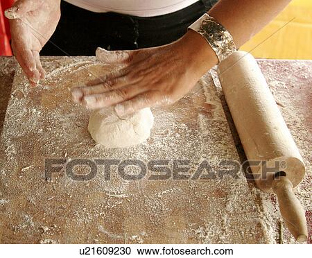 Stock Image - Making Homemade Naan Bread. Fotosearch