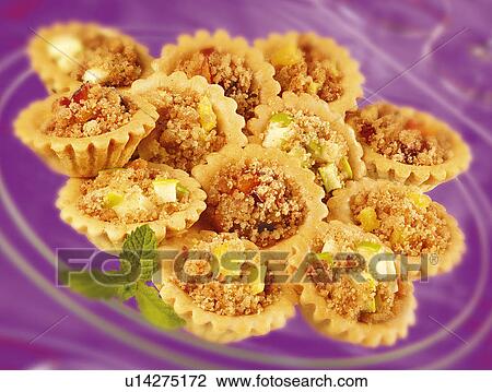 Mini fruit crumble tarts View Large Photo Image Stock Image - Mini fruit crumble tarts. Fotosearch