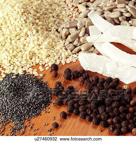 Stock Image - Mixed seeds and coconut. Fotosearch