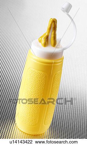 Stock Image - Plastic Squeezy Mustard Bottle - Non Exclusive. Fotosearch